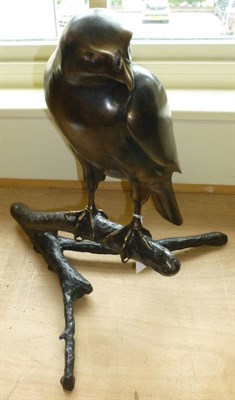 Lot 67 - William Wilson - 'Goshawk', modern cast bronze figure of a goshawk perched on a branch, produced in