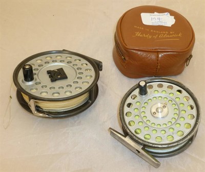 Lot 104 - A Hardy 'L.R.H.Lightweight' Fly Reel, with slim black handle, pierced drum, alloy foot, grey enamel