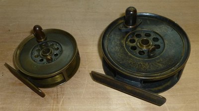 Lot 152 - Two Brass Fly Reels by J.B.Moscrop, Manchester, 4inch and 3inch, with horn handles and caged drums