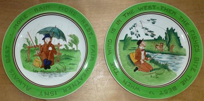 Lot 153 - A Pair of Wedgewood Cream Pottery Plates, printed and painted with comic fishing scenes - 'In a Fix