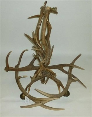 Lot 218 - A 1920's Three-Light Chandelier, composed entirely of Red Deer antlers, 80cm high overall  This...