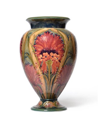 Lot 483 - A William Moorcroft Revived Cornflower Pattern Pedestal Vase, circa 1913, on a mottled green...