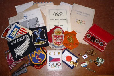 Lot 4 - A Collection of Olympic Badges and Related Material, includes cloth and metal badges from...