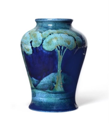 Lot 487 - A William Moorcroft Moonlit Blue Landscape Pattern Vase, circa 1925, green painted monogram,...