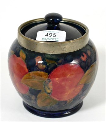 Lot 496 - A William Moorcroft Pomegranate Pattern Tobacco Jar and Cover, with plated rim engraved...