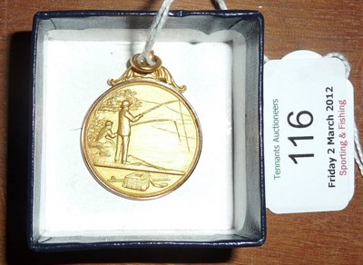 Lot 116 - A 9ct Gold Fishing Medal, marks for Birmingham, maker 'W & H', with fishing scene to front, the...