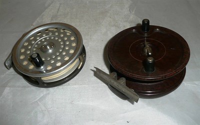 Lot 140 - A Hardy 'Marquis No.7' Reel, in leather zip case, and an Allcock's bakelite 'Aerialite' reel (2)