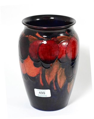 Lot 499 - A William Moorcroft Flambé Wisteria Pattern Vase, impressed factory marks, paper warrant label...