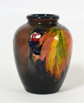 Lot 500 - A William Moorcroft Flambé Leaf and Grape Pattern Vase, impressed POTTER TO H.M THE QUEEN and...