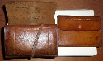 Lot 199 - A Leather Fly Wallet 'The Wharfedale Fly Book', printed with a list of flies on velum pages,...