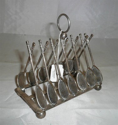 Lot 5 - A Silver Plated Brass Tennis Racquet Toast Rack, with fourteen upright racquets on rectangular base