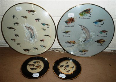 Lot 92 - Two Glazed Circular Displays of Salmon Flies, each with a watercolour of a salmon to the centre...