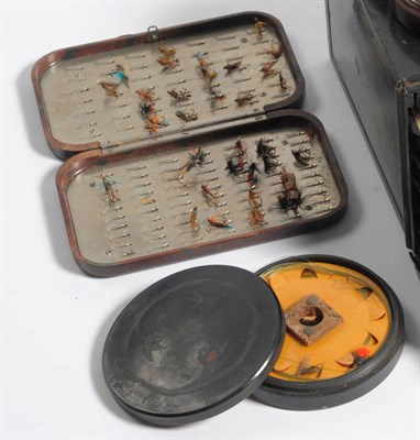 Lot 107 - A Hardy Brown Bakelite 'Neroda' Fly Box, containing some flies, 16cm by 9.5cm; Two Hardy...