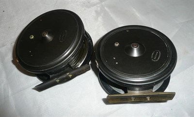 Lot 124 - Two Walker Bampton 4-Inch Alloy Salmon Reels, each with fat black handle on pierced drum, two screw