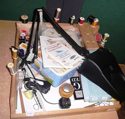 Lot 180 - A Collection of Fly-tying Materials and Equipment, including a lamp, two boxes of flies, nylons and