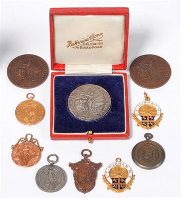 Lot 5 - Ten Motorcycling Medallions Awarded to Stan Jones, comprising a 9ct gold Auto Cycle Union Six...