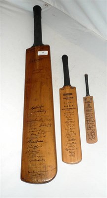 Lot 11 - A Don Bradman Junior World Record Cricket Bat, signed to the face in pen by nineteen Australian...