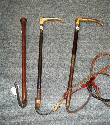 Lot 52 - Two Antler Handled Hunting Whips, with silver ferrules and plaited leather covered bodies; A Riding