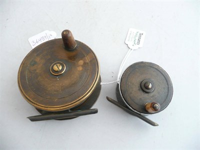 Lot 98 - Two Platewind Reels - 3 1/2inch brass with horn handle reel and a 2 1/4inch alloy with brass...