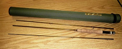 Lot 117 - A Sage 8ft 6in 3pce Carbon `Launch' Fly Rod, no.386-4 no.3 line 3 1/4oz, in nylon zip case.