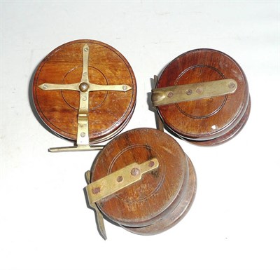 Lot 131 - Three Wooden Nottingham Reels, including a 4inch reel with brass star back and two horn handles...