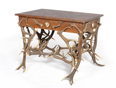 Lot 151 - A German Antler Mounted Stained Wood Writing or Occasional Table, Carl Pieters, Neustadt, circa...