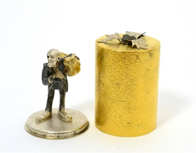 Lot 575 - Stuart Devlin (b.1931): A Silver-Gilt Surprise Christmas Carol Box, London 1973, cylindrical...