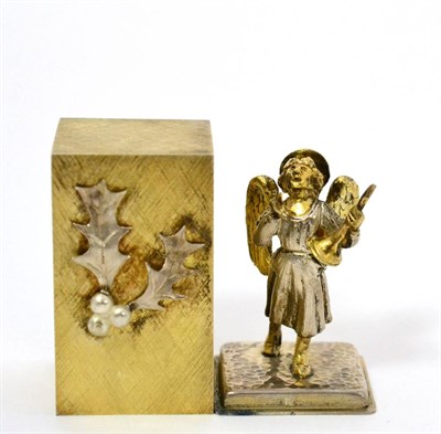 Lot 576 - Stuart Devlin (b.1931): A Silver-Gilt Surprise Christmas Carol Box, London 1974, rectangular...