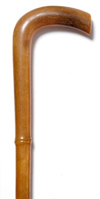 Lot 213 - A Rhinoceros Horn Walking Stick, circa 1907 or earlier, overall length 85.5cm, circumference of...