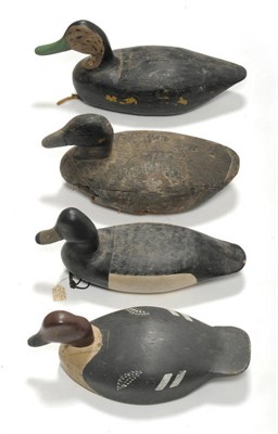 Lot 320 - A Group of Four North American Carved Wood, Polychrome Painted and Lead Weighted Decoy Ducks,...