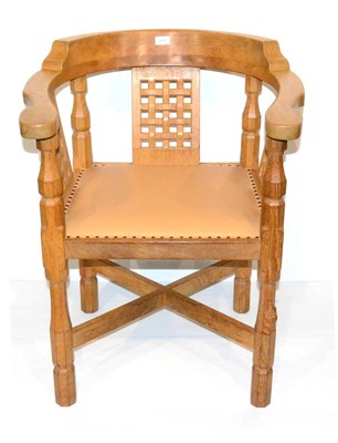 Lot 602 - A Robert  "Mouseman " Thompson Oak Monk's Chair, with curved back and shaped arms, over three...