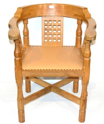 Lot 603 - A Robert  "Mouseman " Thompson Oak Monk's Chair, with curved back and shaped arms, over three...