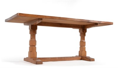 Lot 604 - A Robert  "Mouseman " Thompson Oak 6ft Three Plank Refectory Table, on two octagonal legs joined by