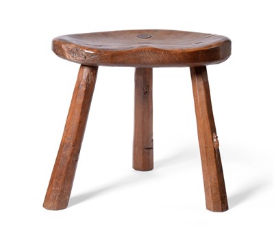 Lot 615 - A Robert  "Mouseman " Thompson Oak Cow Stool, circa 1930's, on three octagonal legs, with...