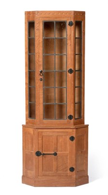 Lot 623 - A Malcolm  "Foxman " Pipes Oak Corner Display Cabinet, penny moulded frieze, the upper section with