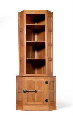 Lot 631 - A Graham  "Swanman " Duncalf Oak Floor Standing Corner Cupboard, with open upper section,...