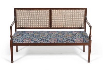 Lot 636 - Attributed to Morris & Co: A Mahogany Bergere Settee, circa 1900, the rectangular back with...