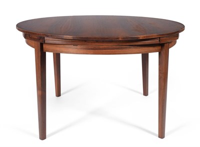 Lot 646 - A Dyrlund Brazilian Rosewood Flip Flap or Lotus Circular Extending Dining Table, circa 1960's,...