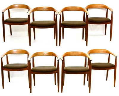 Lot 649 - A Set of Six Danish Teak Dining Chairs, with curved top rails and arms, on four tapering legs,...