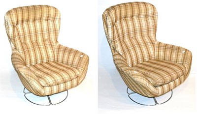 Lot 651 - A Pair of 1970's Swedish Swivel Chairs, upholstered in a brown and cream check fabric, on a...