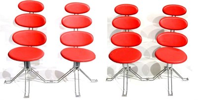 Lot 654 - A Set of Four 1960's Swivel Chairs, the four red vinyl oval pads, above a circular seat, on...