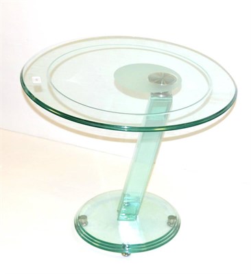 Lot 658 - An Italian Glass and Aluminium Table, the circular cut and etched top on an aluminium fitting,...