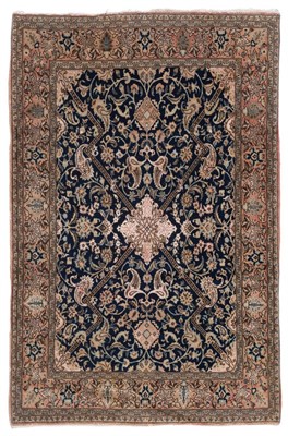 Lot 845 - Unusual Part Silk Ghom Rug Central Persia, circa 1950 The indigo field of palmettes and vines...