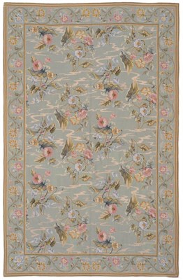 Lot 848 - Fine Portuguese Needlepoint Carpet The soft mint green field with columns of floral sprays enclosed