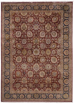 Lot 861 - Good Indian Carpet The deep terracotta field with an allover Shah Abbas design of palmettes and...