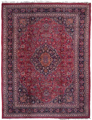 Lot 865 - Mashad Carpet Khorasan, North East Persia The raspberry field of scrolling floral vines centred...