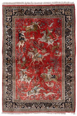 Lot 866 - Ghom Silk Rug Central Persia The brick red field depicting a hunt, the horsemen in pursuit of...