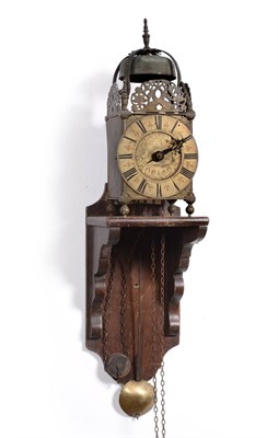 Lot 888 - A 17th Century Brass Lantern Clock, signed John Clowes, Londini Fecit, circa 1690, four posted...