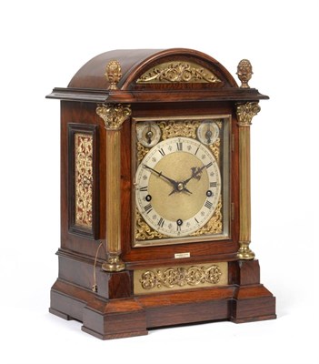 Lot 893 - A Rosewood Chiming Table Clock, circa 1890, arched top with finials, side sound fret doors,...