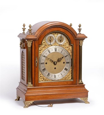 Lot 896 - A Walnut Chiming Table Clock, circa 1890, arched top with side finials, pierced brass side...